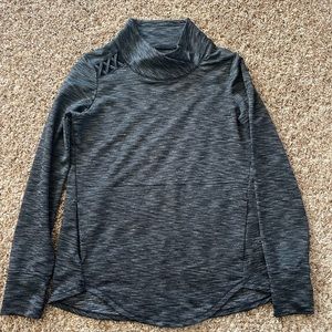 Maurice’s active wear dry fit shirt w/ front pocket and thumb holes.